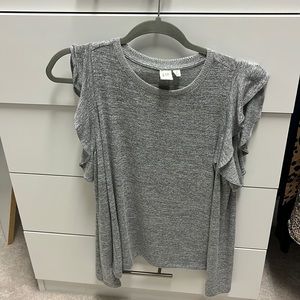 Grey lightweight sweater with cut out and ruffled shoulder